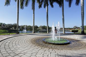 Lake view fountain benches Miramar Florida